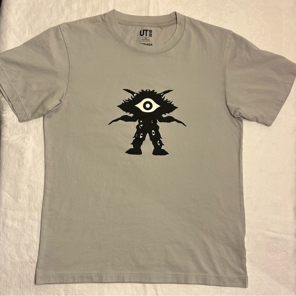 Ultraman T Shirt by Uniqlo. Very light grey. Size XS